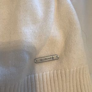 Smart wool turtleneck sweater.